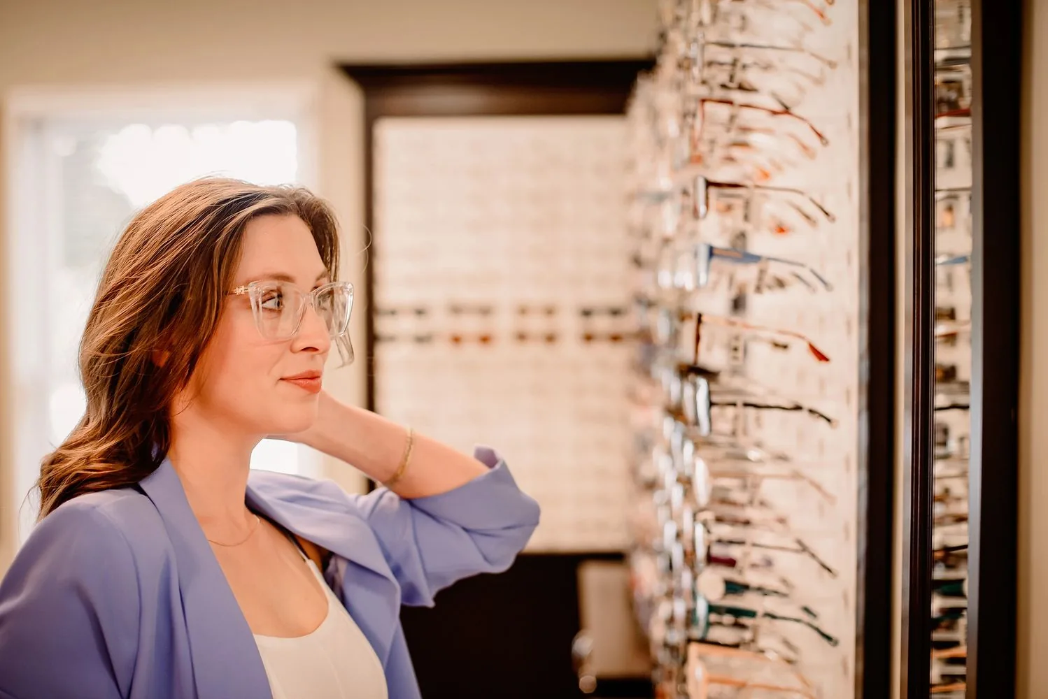 Patient trying on eyeglass frames at Athens Family Vision